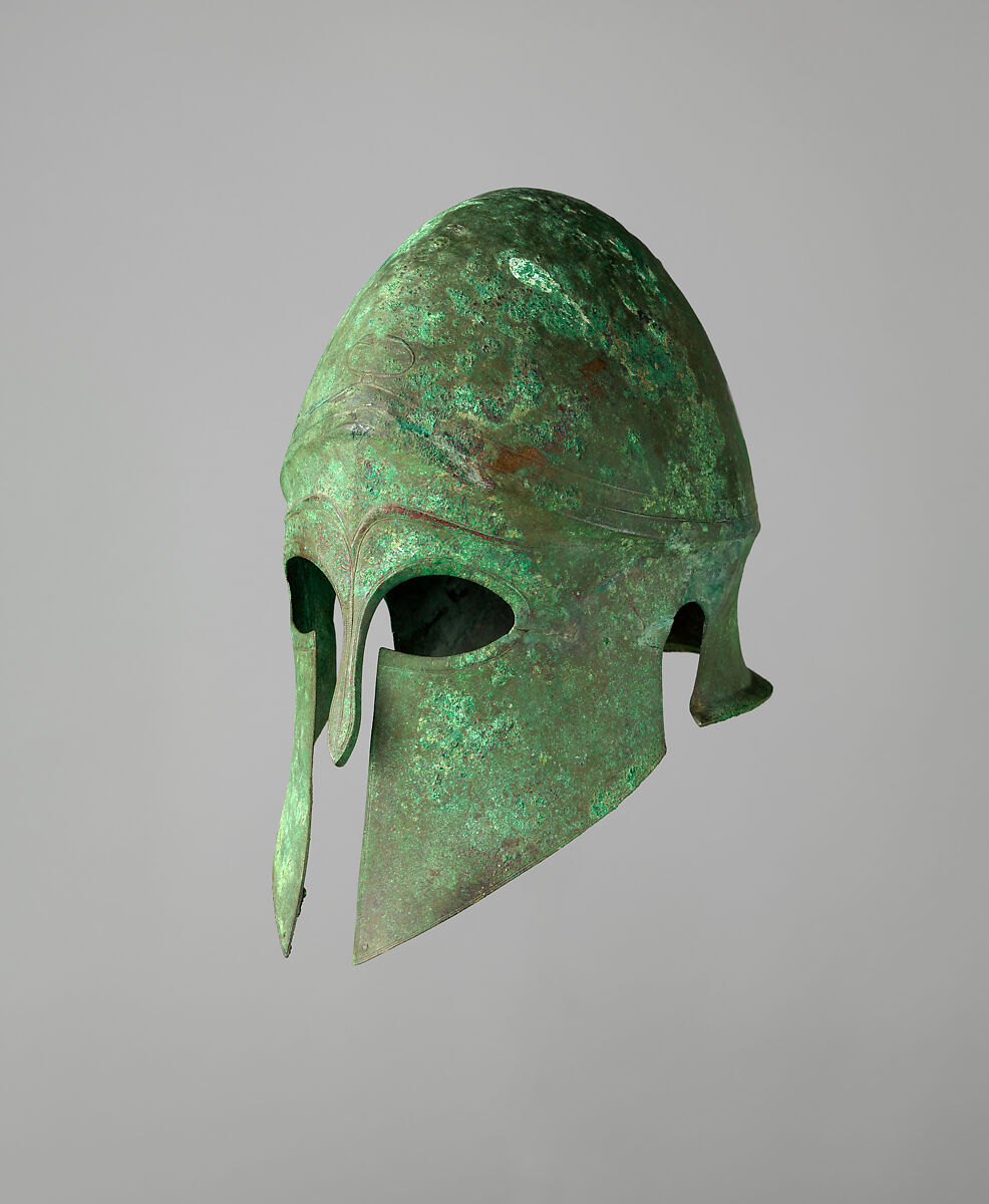 Helmet of the Corinthian Type and Pair of Greaves, Bronze, Greek 