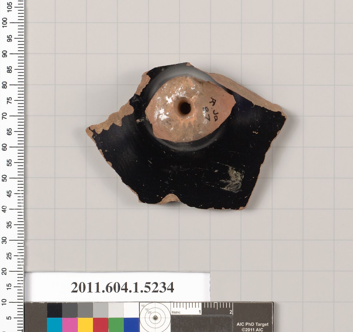 Terracotta fragment of a kylix (drinking cup), Terracotta, Greek, Attic