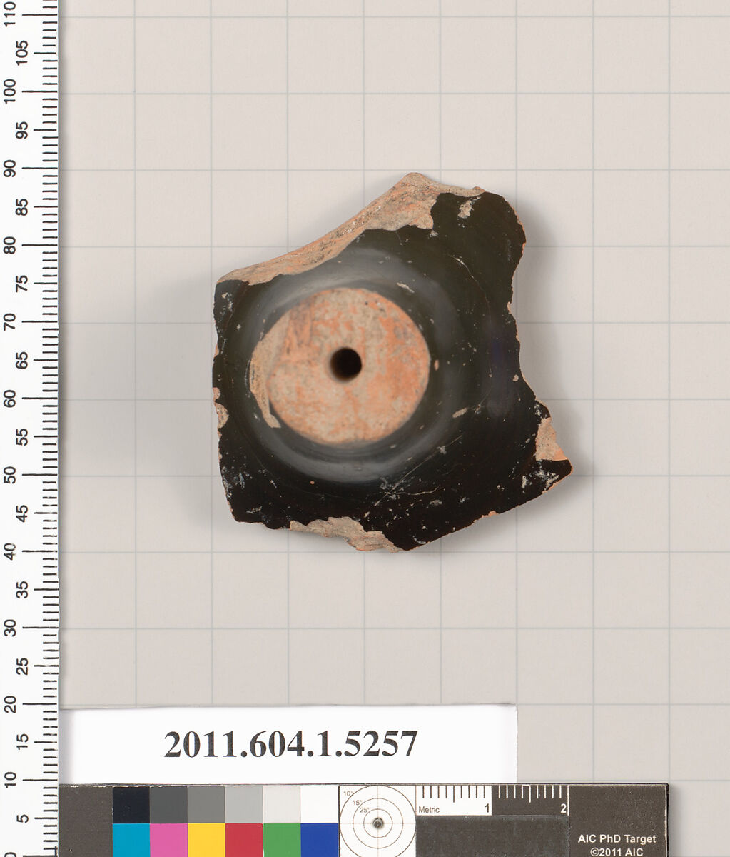 Terracotta fragment of a kylix (drinking cup), Terracotta, Greek, Attic