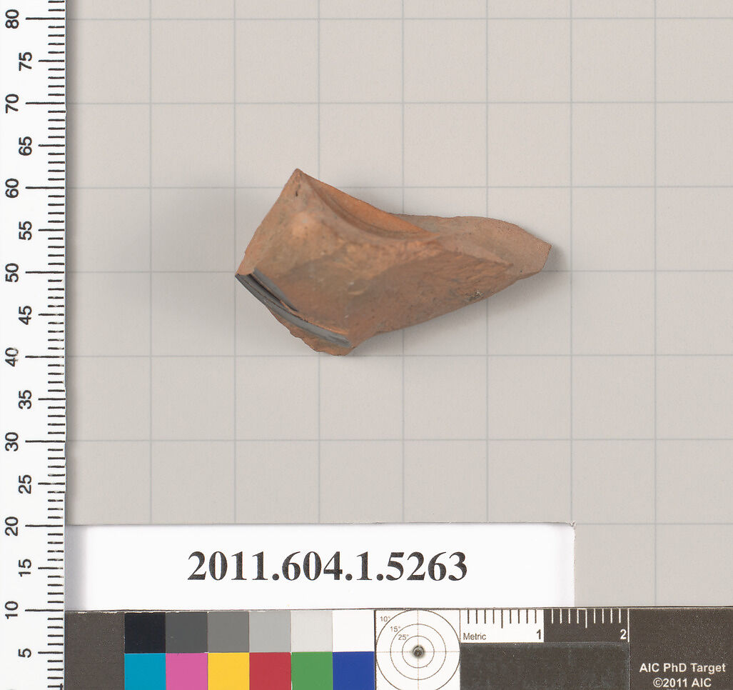 Terracotta fragment of a kylix (drinking cup), Terracotta, Greek, Attic