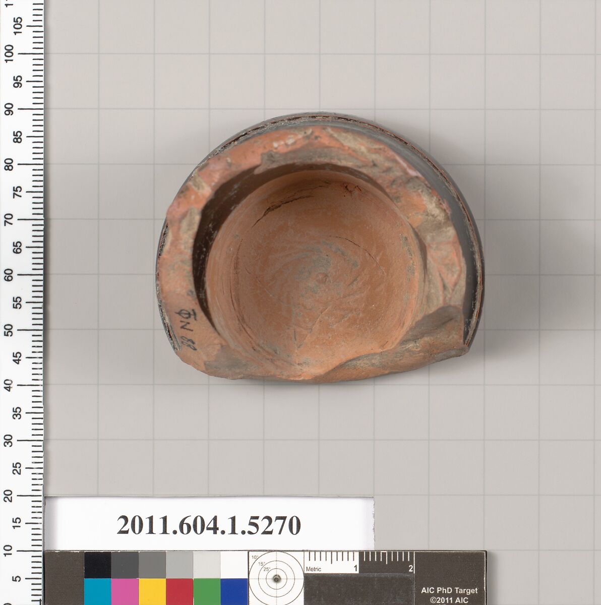 Terracotta fragment of a kylix (drinking cup), Terracotta, Greek, Attic