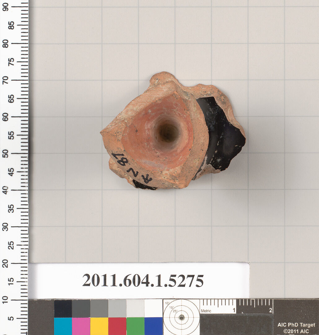 Terracotta fragment of a kylix (drinking cup), Terracotta, Greek, Attic
