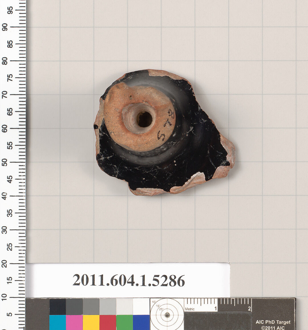 Terracotta fragment of a kylix (drinking cup), Terracotta, Greek, Attic