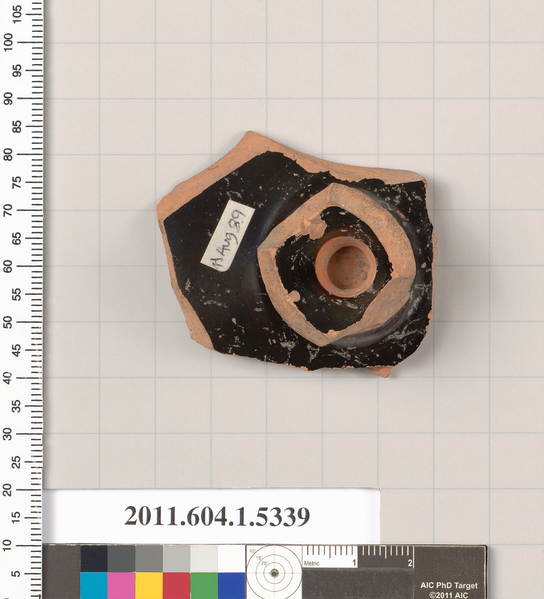 Terracotta fragment of a kylix (drinking cup), Terracotta, Greek, Attic