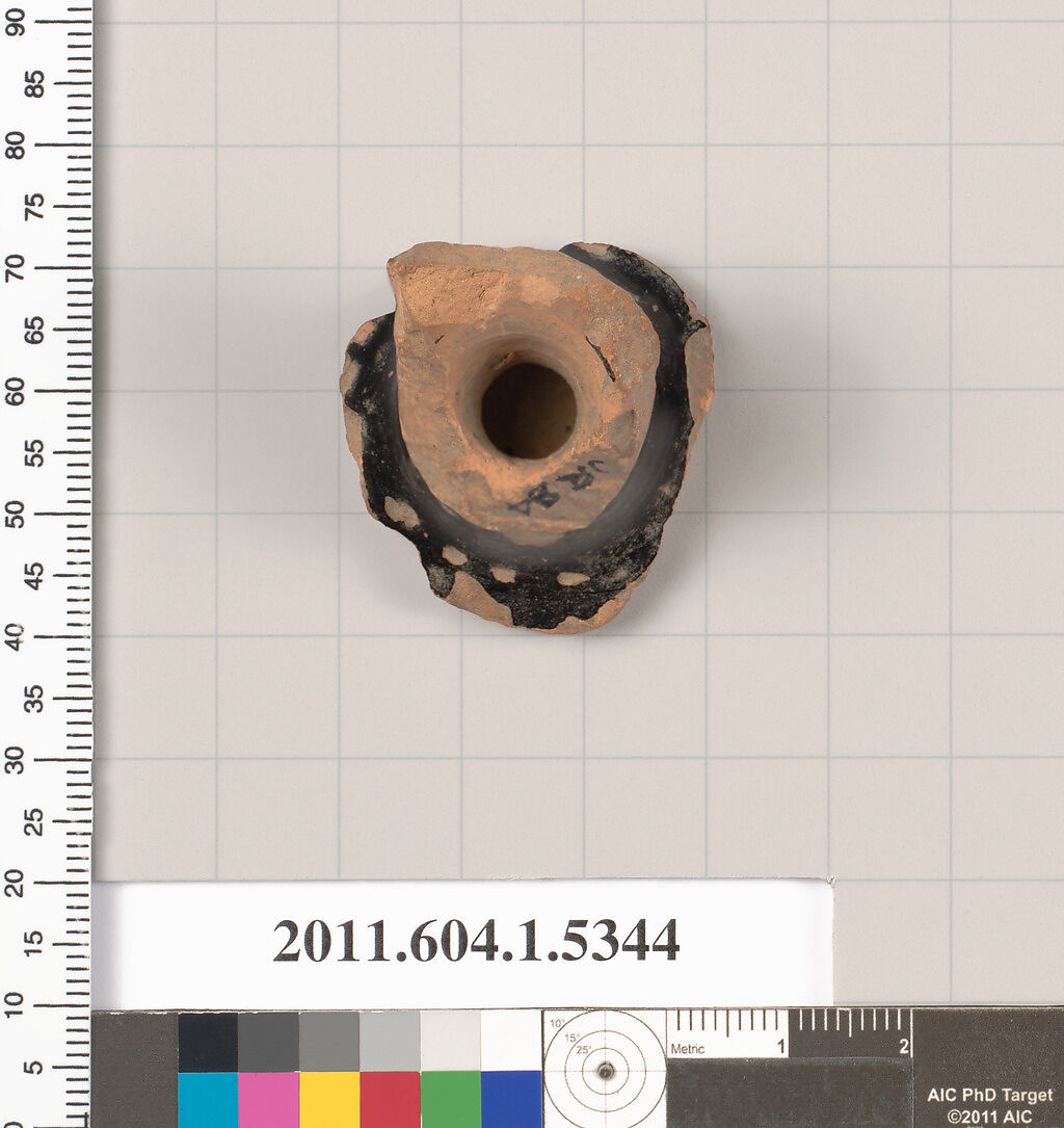 Terracotta fragment of a kylix (drinking cup), Terracotta, Greek, Attic