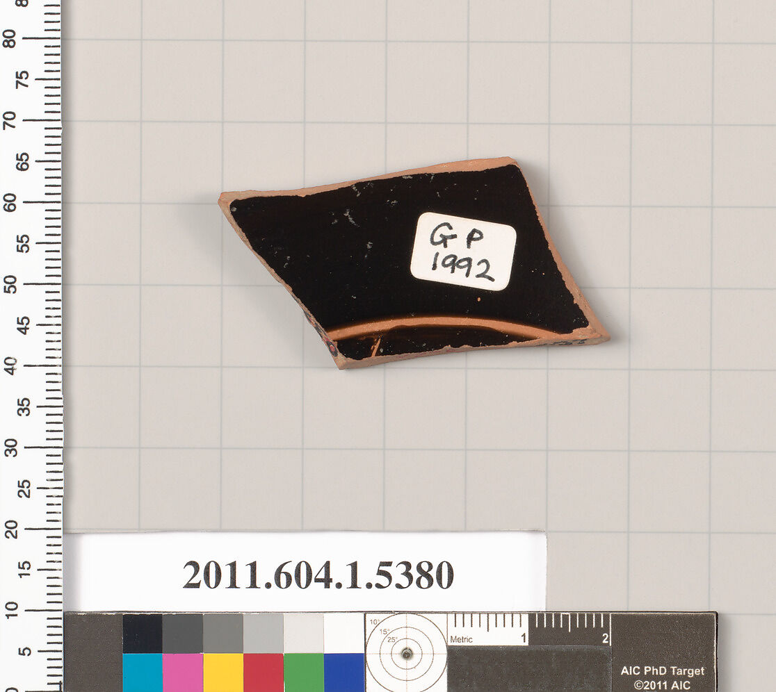 Terracotta fragment of a kylix (drinking cup), Terracotta, Greek, Attic 