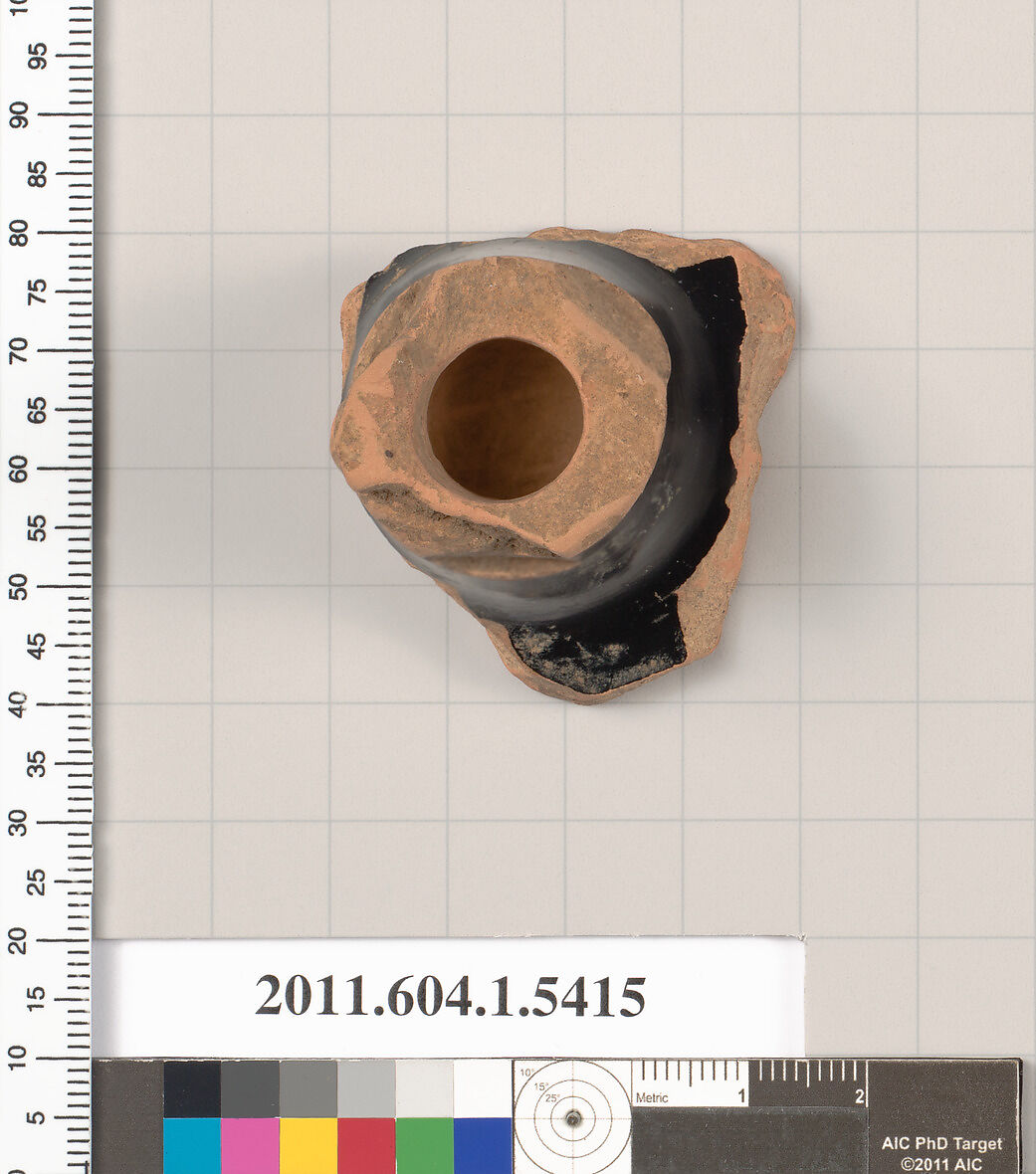 Terracotta fragment of a kylix (drinking cup), Terracotta, Greek, Attic