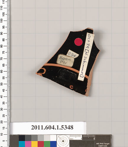 Terracotta fragment of a kylix (drinking cup)