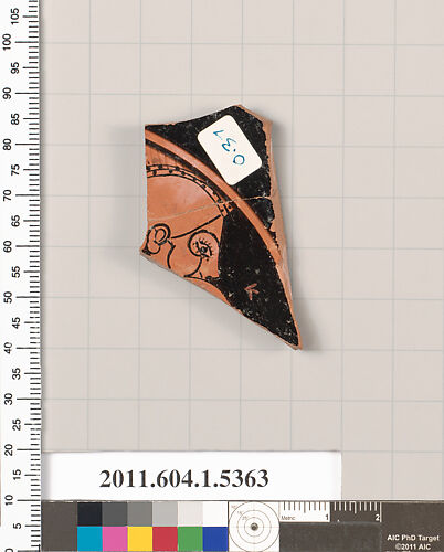 Terracotta fragment of a kylix (drinking cup)