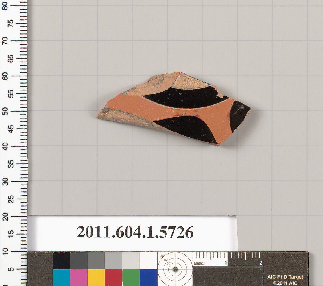 Terracotta fragment of a kylix: eye-cup  (drinking cup), Terracotta, Greek, Attic 