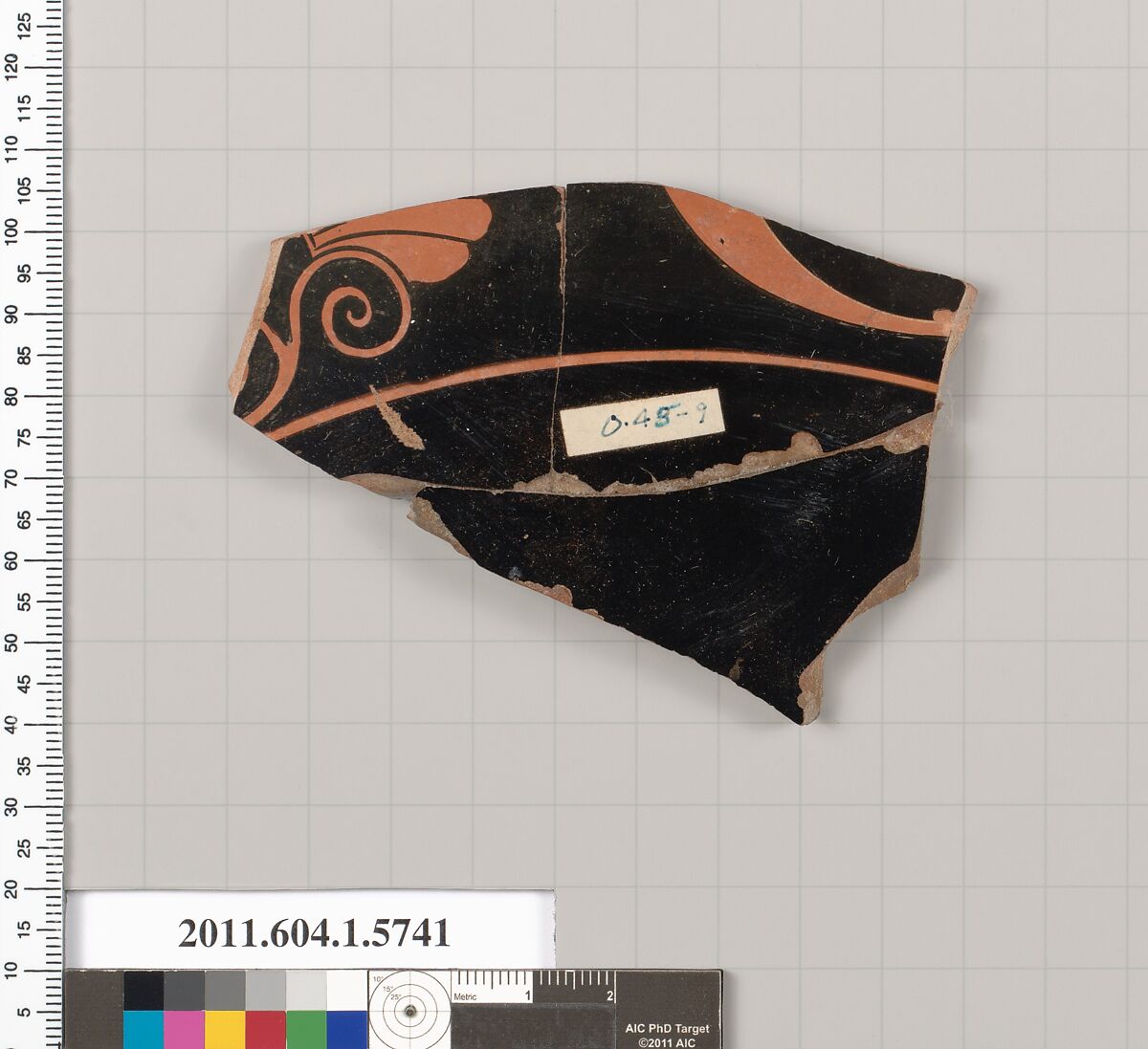 Terracotta fragment of a kylix: eye-cup  (drinking cup), Terracotta, Greek, Attic 