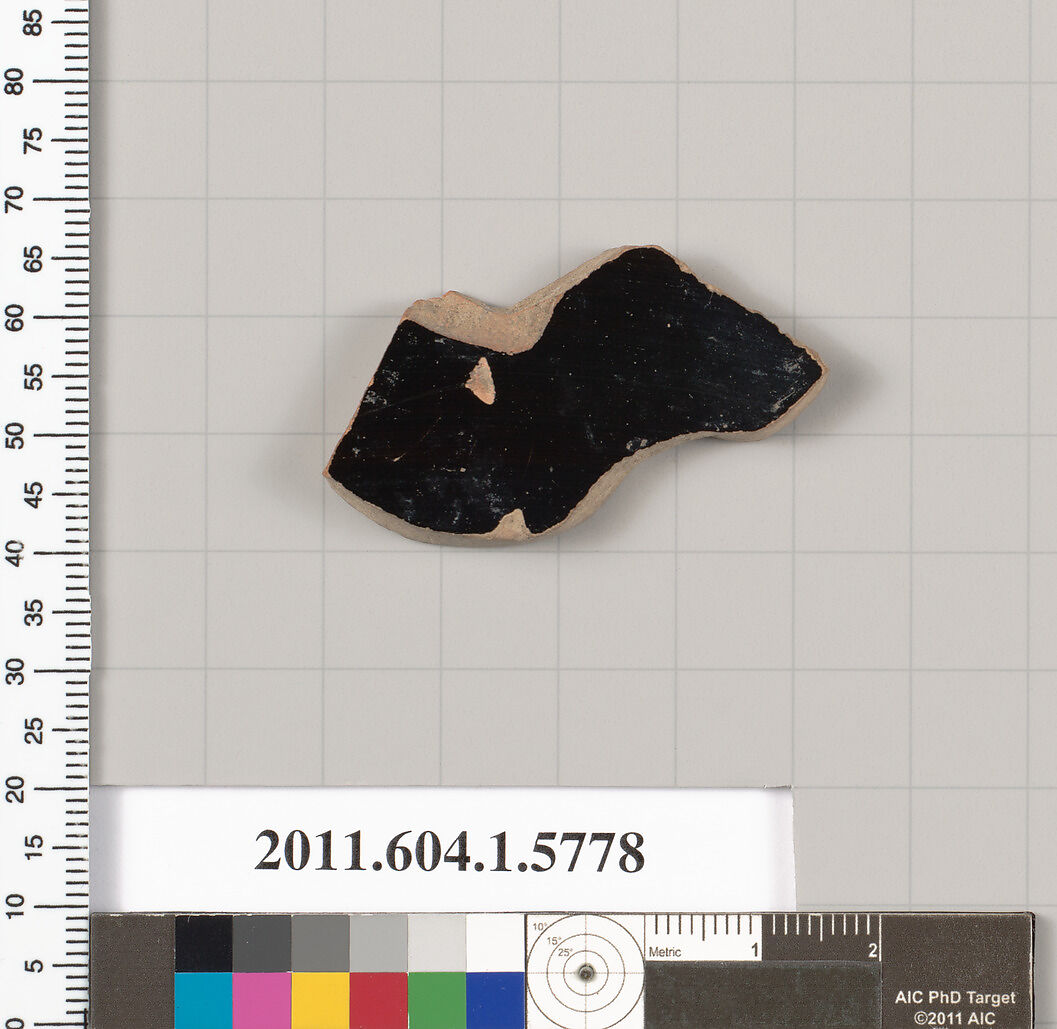 Terracotta fragment of a kylix: eye-cup  (drinking cup), Terracotta, Greek, Attic