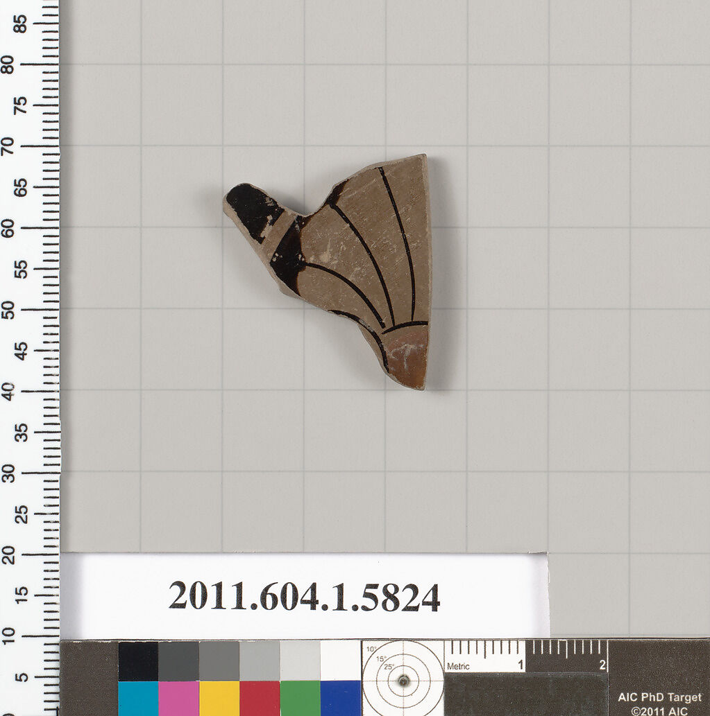 Terracotta fragment of a kylix: eye-cup  (drinking cup), Terracotta, Greek, Attic 
