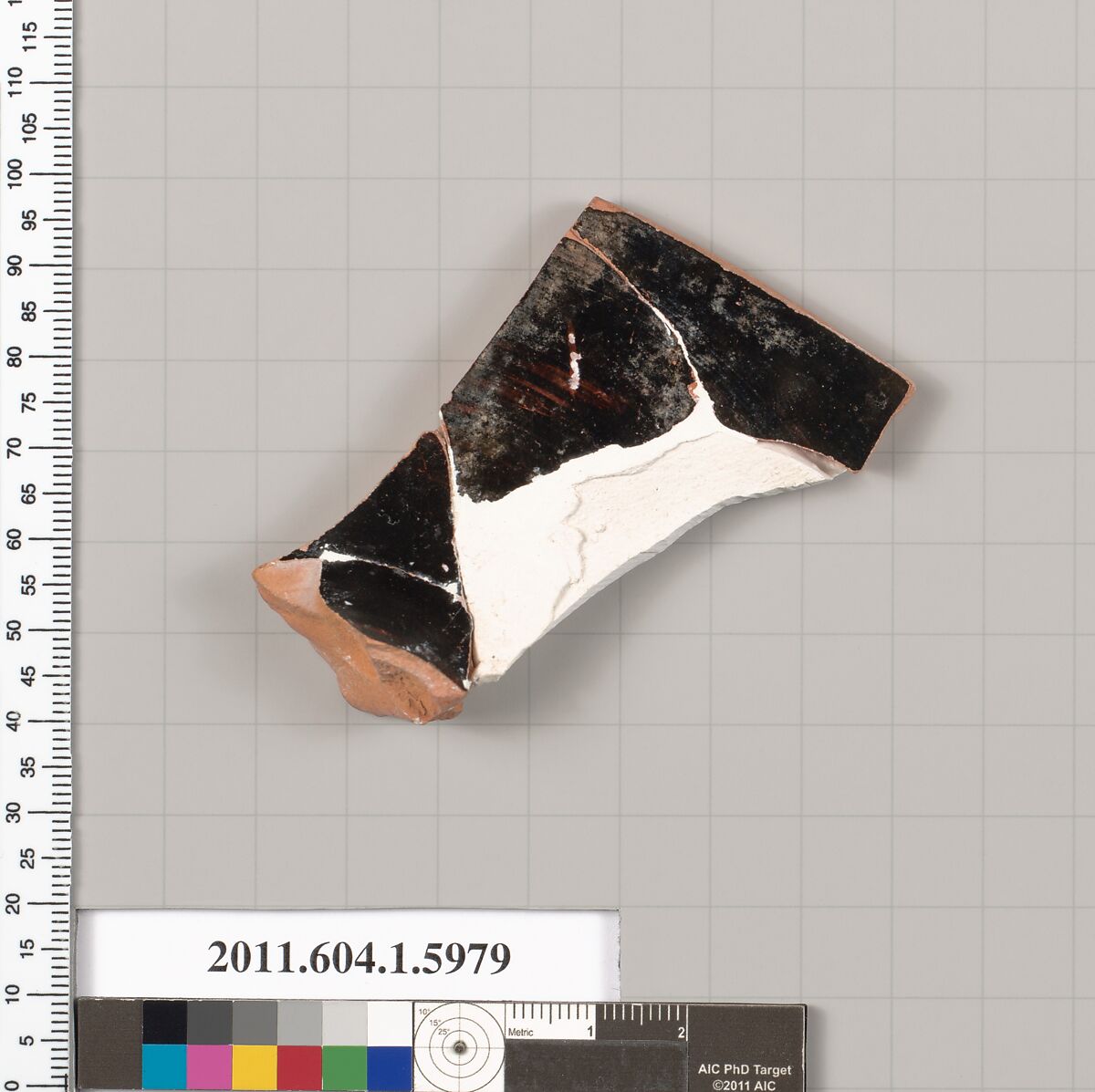 Terracotta fragment of a kylix (drinking cup), Terracotta, Greek, Attic