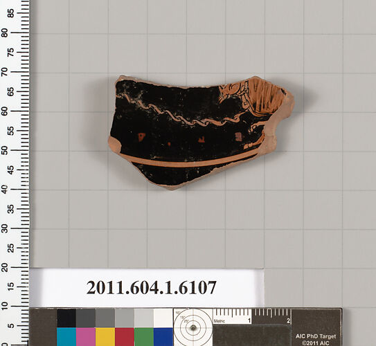 Terracotta fragment of a kylix (drinking cup)