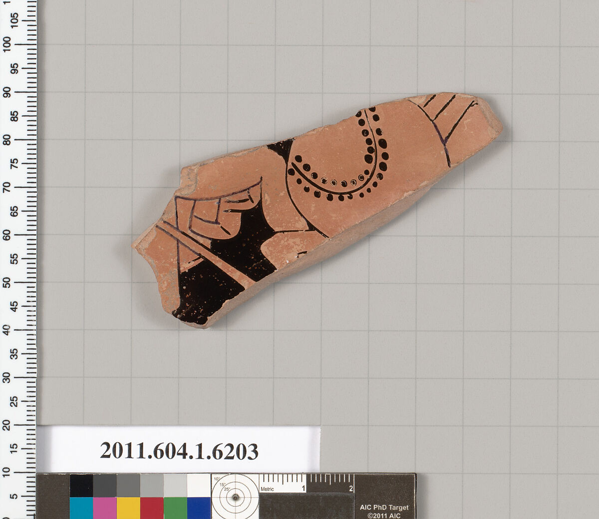 Terracotta fragment of a kylix (drinking cup), Attributed to the Painter of the Louvre Komoi [DvB], Terracotta, Greek, Attic