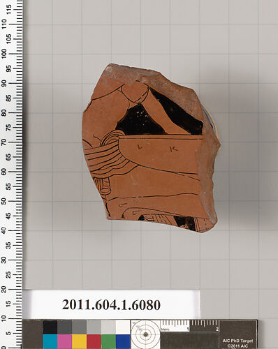 Terracotta fragment of a kylix (drinking cup)