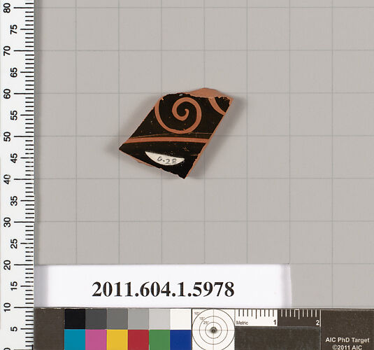 Terracotta fragment of a kylix (drinking cup)