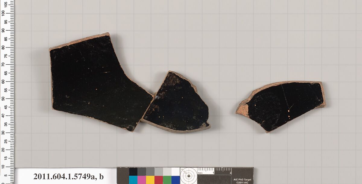 Terracotta fragments of a kylix: eye-cup (drinking cup), Attributed to Pheidippos [DvB], Terracotta, Greek, Attic