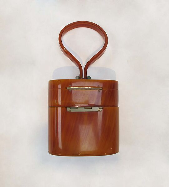 Purse, plastic (cellulose acetate), metal (copper), American