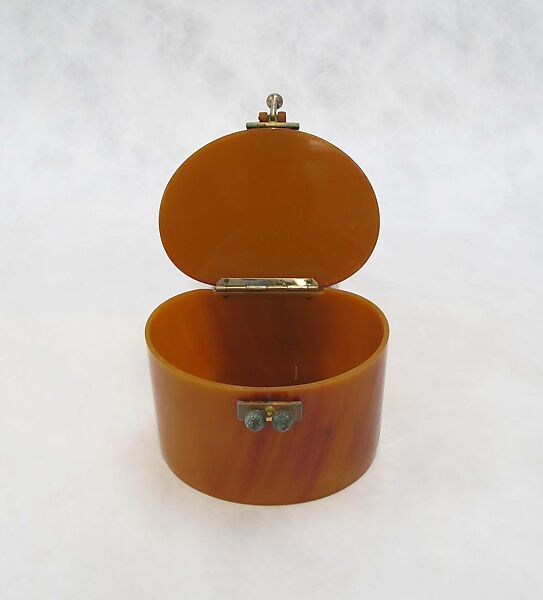 Purse, plastic (cellulose acetate), metal (copper), American
