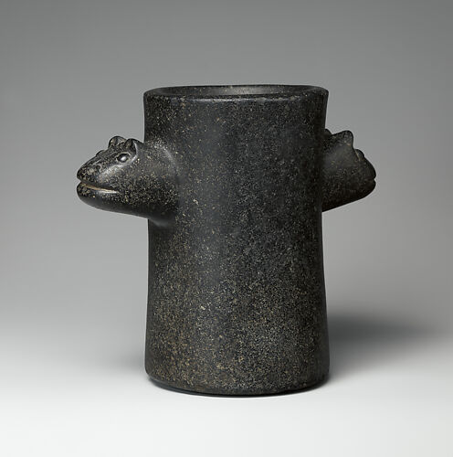 Beaker with animal heads