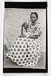 Young Woman Seated in Apple Print Dress, Seydou Keïta (Malian, Bamako ca. 1921–2001 Paris), Gelatin silver print