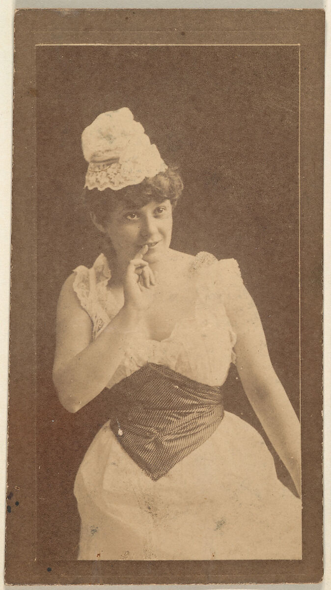 Actress holding finger up to lips, from the Actresses series (N668), Albumen photograph 