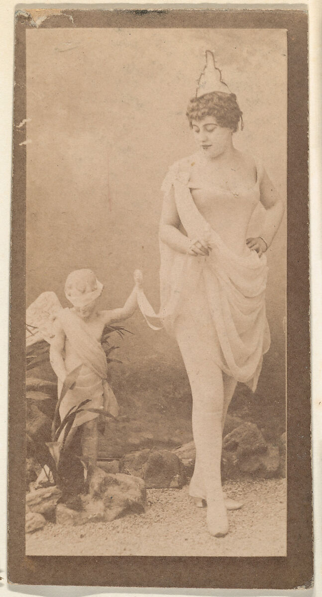 Actress posing with statue of cherub, from the Actresses series (N668), Albumen photograph 