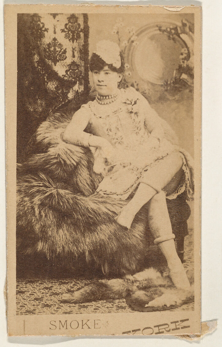 Actress lounging on fur throw, from the series Actresses (N674), promoting New York Dandies, Albumen photograph 