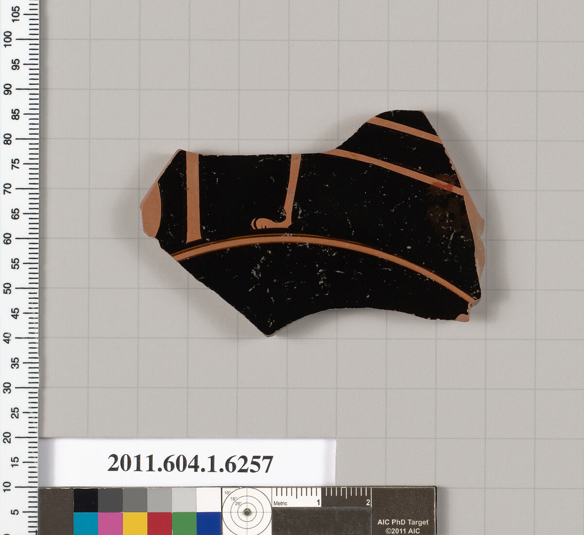 Terracotta fragment of a kylix (drinking cup), Terracotta, Greek, Attic