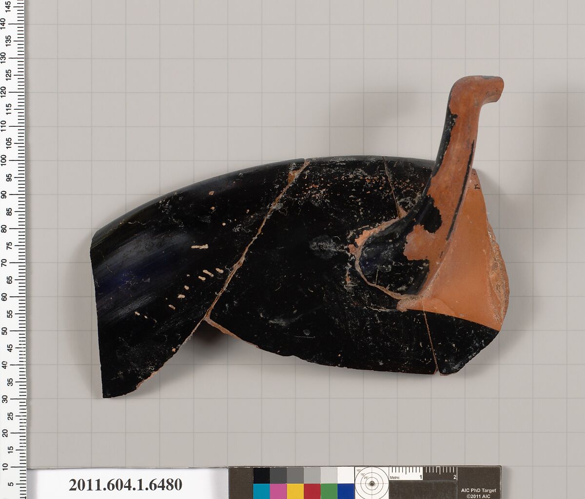 Terracotta fragment of a kylix (drinking cup), Terracotta, Greek, Attic