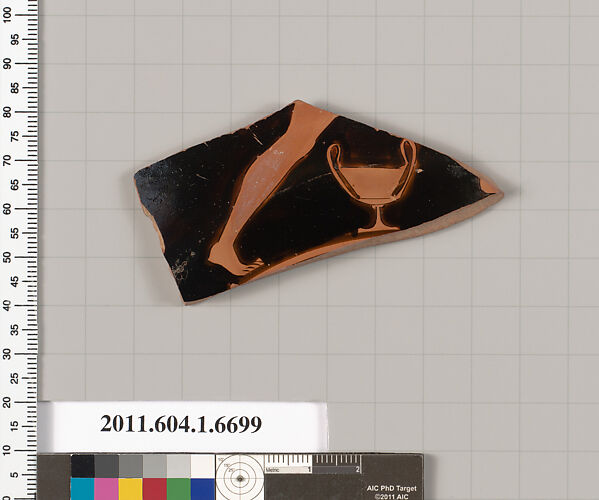 Terracotta fragment of a kylix (drinking cup)