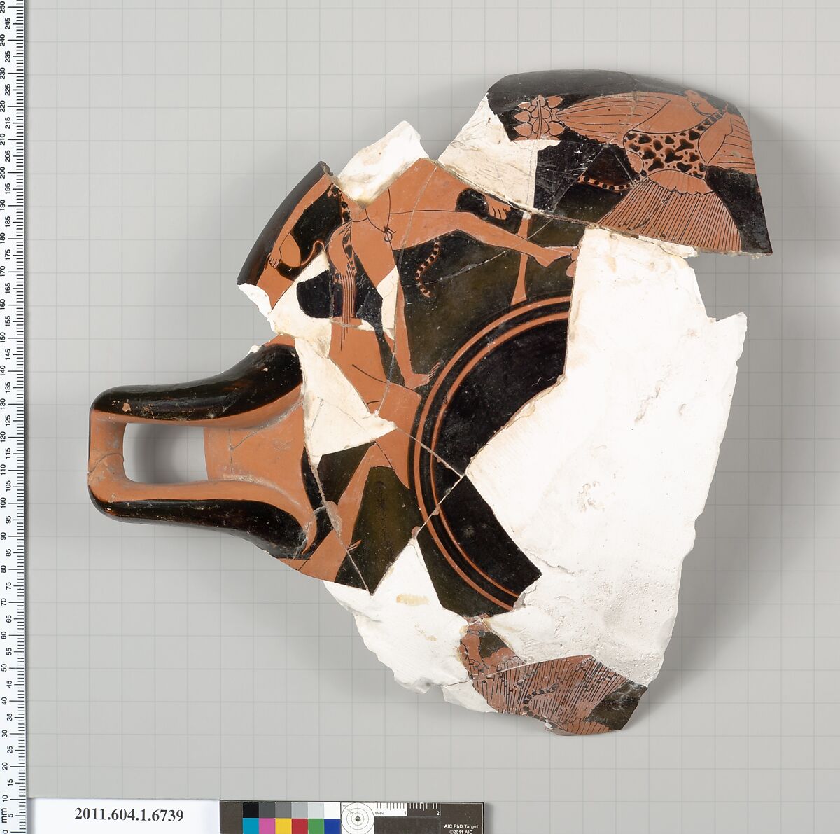 Terracotta fragment of a kylix (drinking cup), Terracotta, Greek, Attic