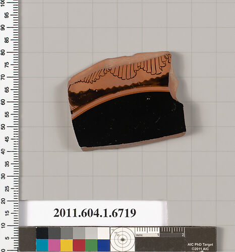 Terracotta fragment of a kylix (drinking cup)