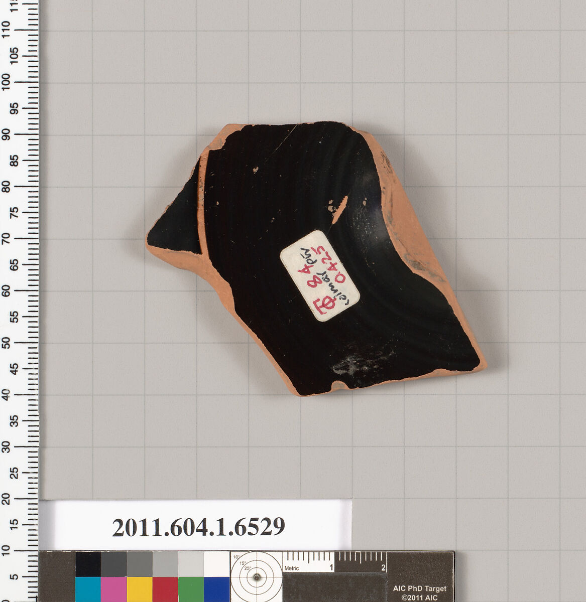 Terracotta fragment of a kylix (drinking cup), Attributed to the Colmar Painter [DvB], Terracotta, Greek, Attic