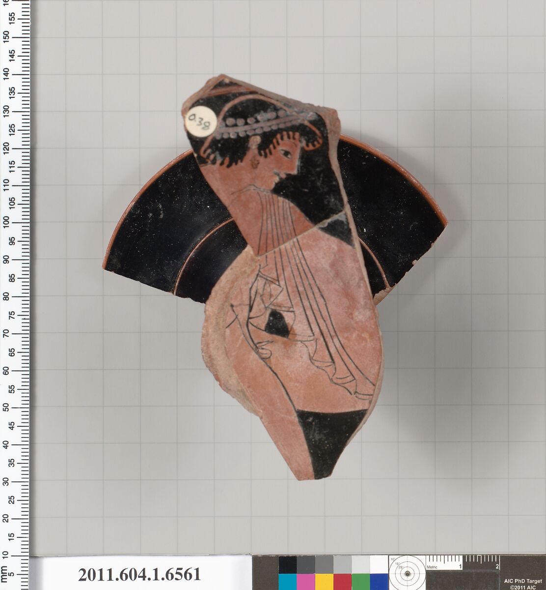 Terracotta fragment of a kylix (drinking cup), Attributed to the Colmar Painter [DvB], Terracotta, Greek, Attic 