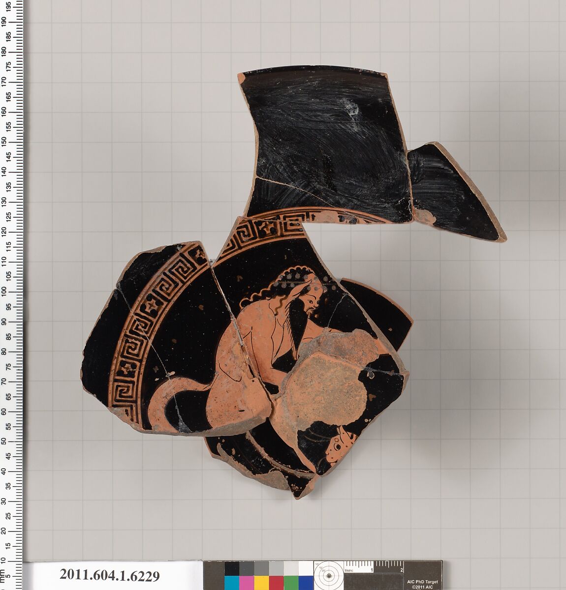 Terracotta fragment of a kylix (drinking cup), Attributed to the Eucharides Painter [DvB], Terracotta, Greek, Attic 