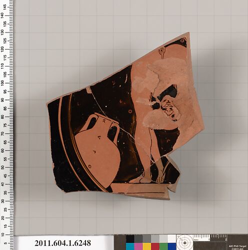 Terracotta fragment of a kylix (drinking cup)