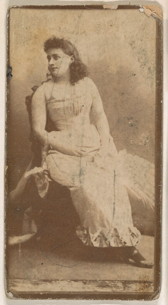Actress seated with hands on lap, from the Actresses series (N664) promoting Old Fashion Fine Cut Tobacco, Albumen photograph 