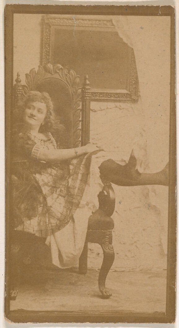 Actress posing on chair with legs resting on armrest, from the Actresses series (N664) promoting Old Fashion Fine Cut Tobacco, Albumen photograph 