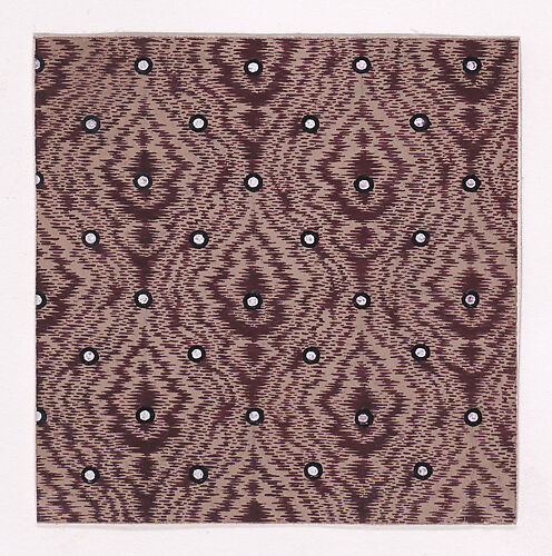 Textile Design of Alternating Rows of Pearls over an Abstract Background Simulating Tie-Dye