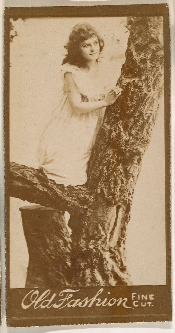 Actress climbing tree, from the Actresses series (N664) promoting Old Fashion Fine Cut Tobacco, Albumen photograph 