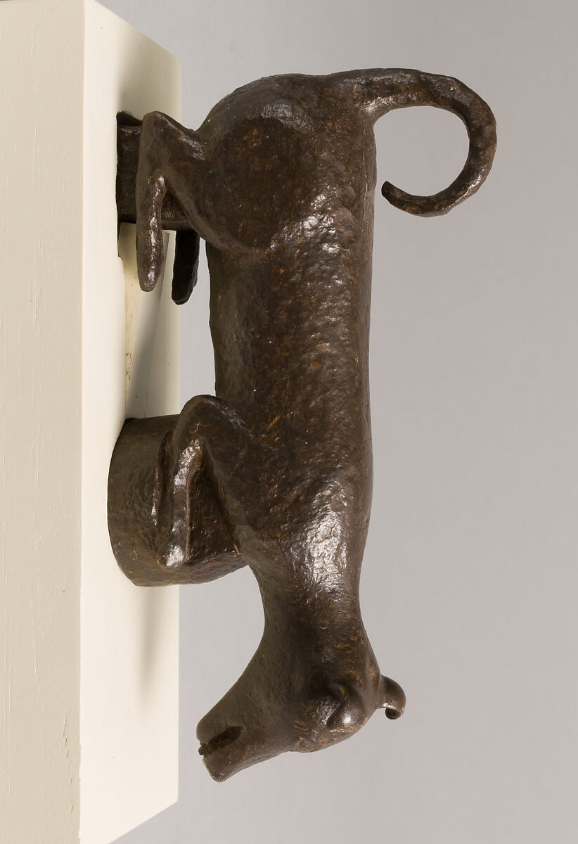 Door knocker in the shape of a small dog or puppy, Wrought iron, Spanish