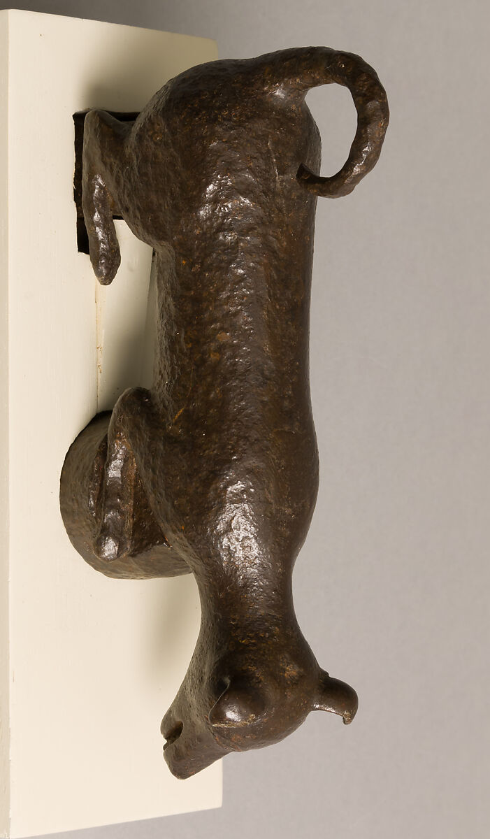 Door knocker in the shape of a small dog or puppy, Wrought iron, Spanish