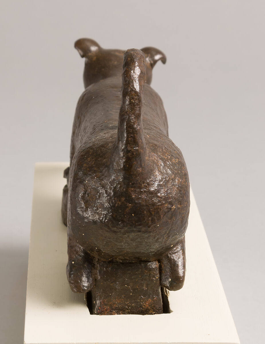 Door knocker in the shape of a small dog or puppy, Wrought iron, Spanish