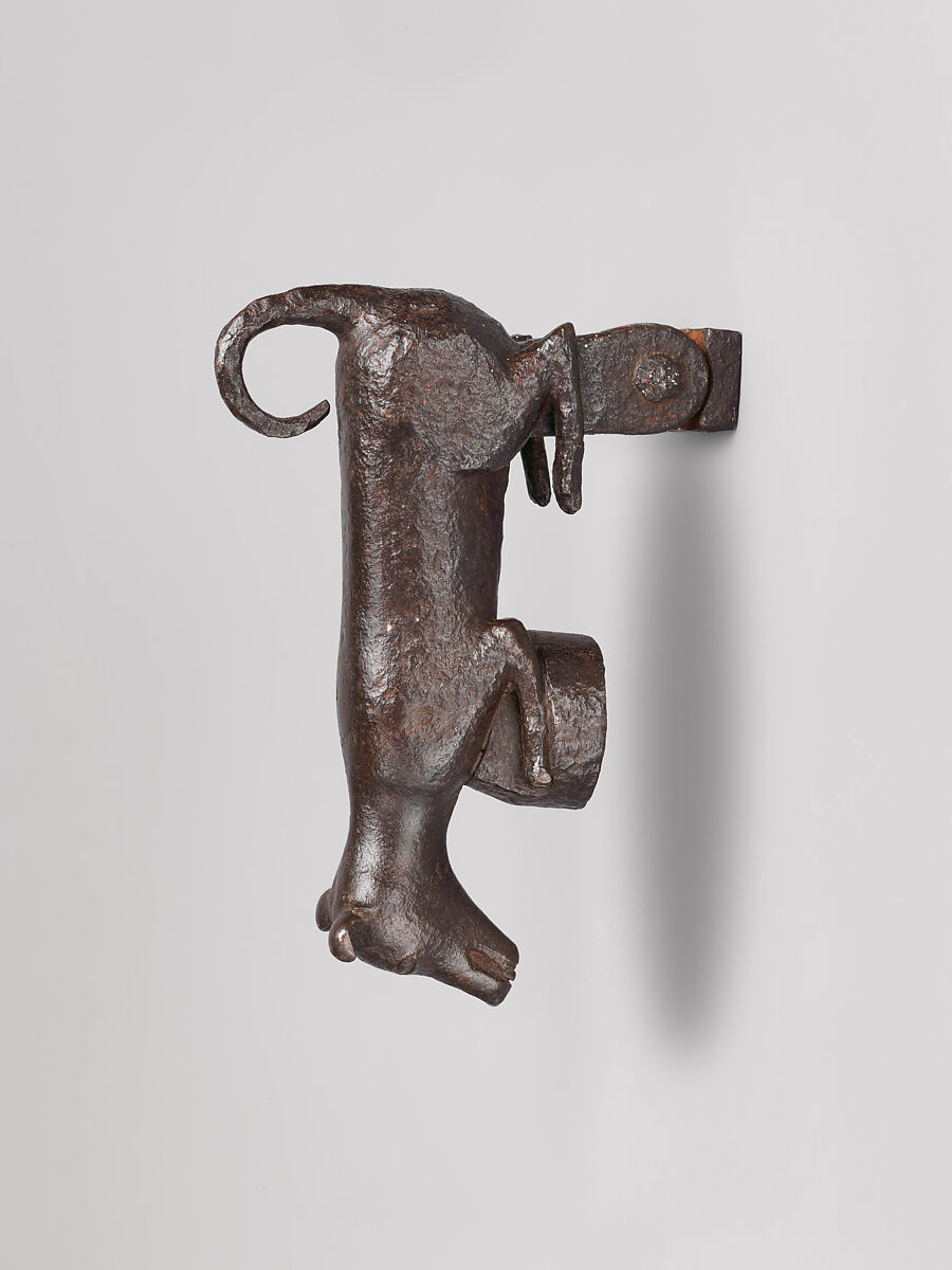 Door knocker in the shape of a small dog or puppy, Wrought iron, Spanish 