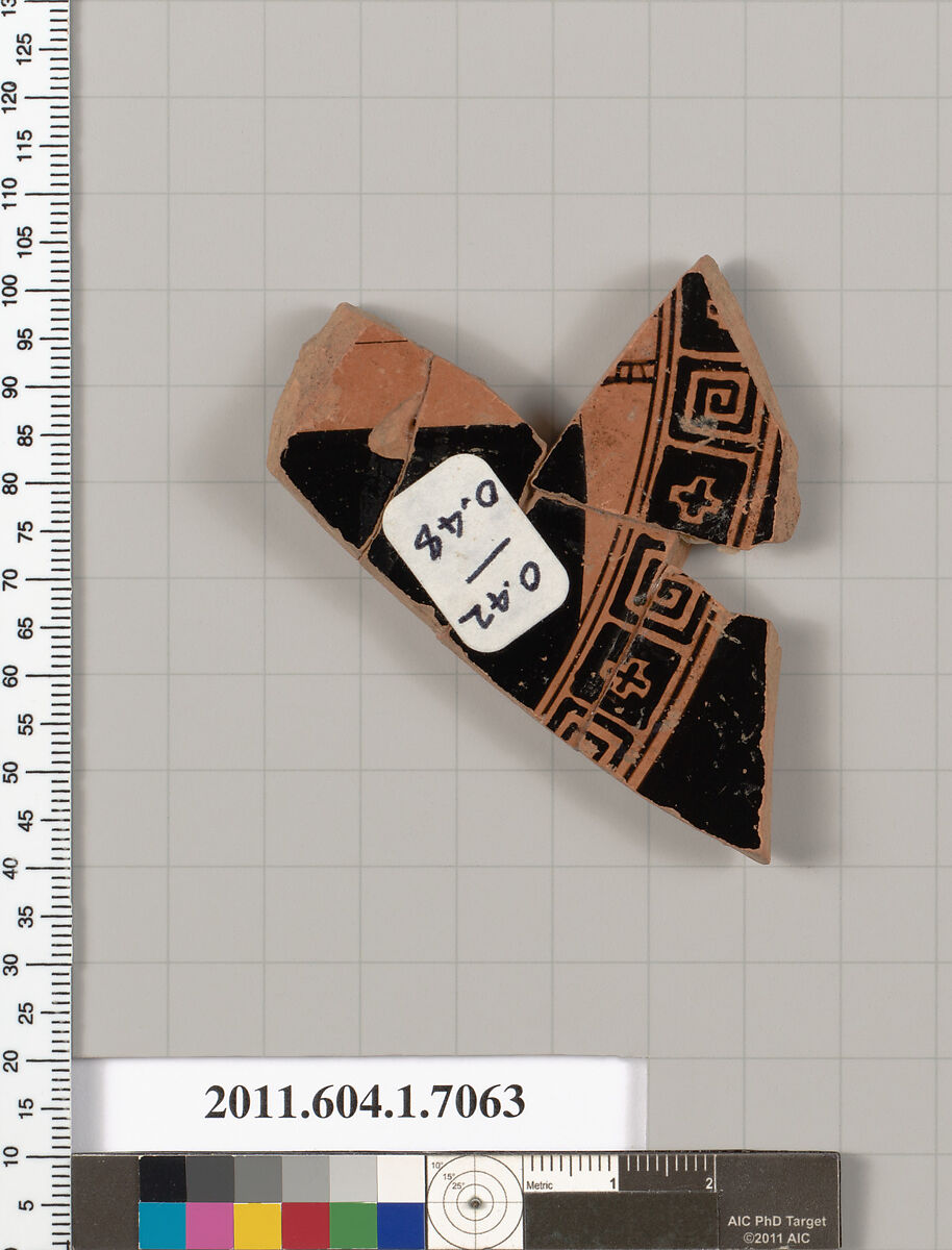 Terracotta fragment of a kylix (drinking cup), Terracotta, Greek, Attic 