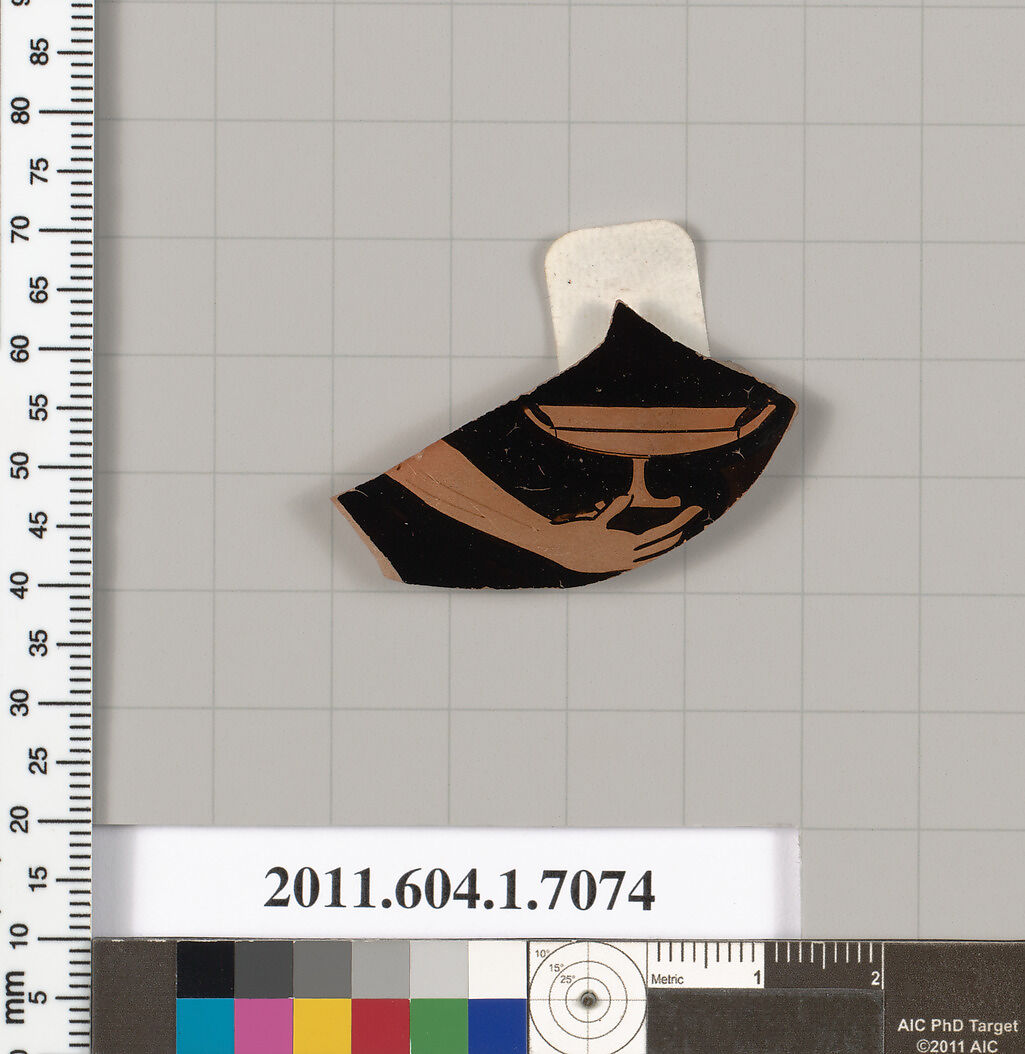 Terracotta fragment of a kylix (drinking cup), Terracotta, Greek, Attic