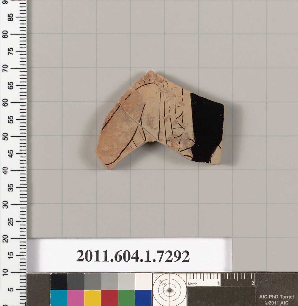 Terracotta fragment of a kylix (drinking cup), Terracotta, Greek, Attic 